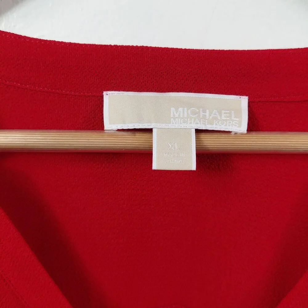 Michael Kors removed material